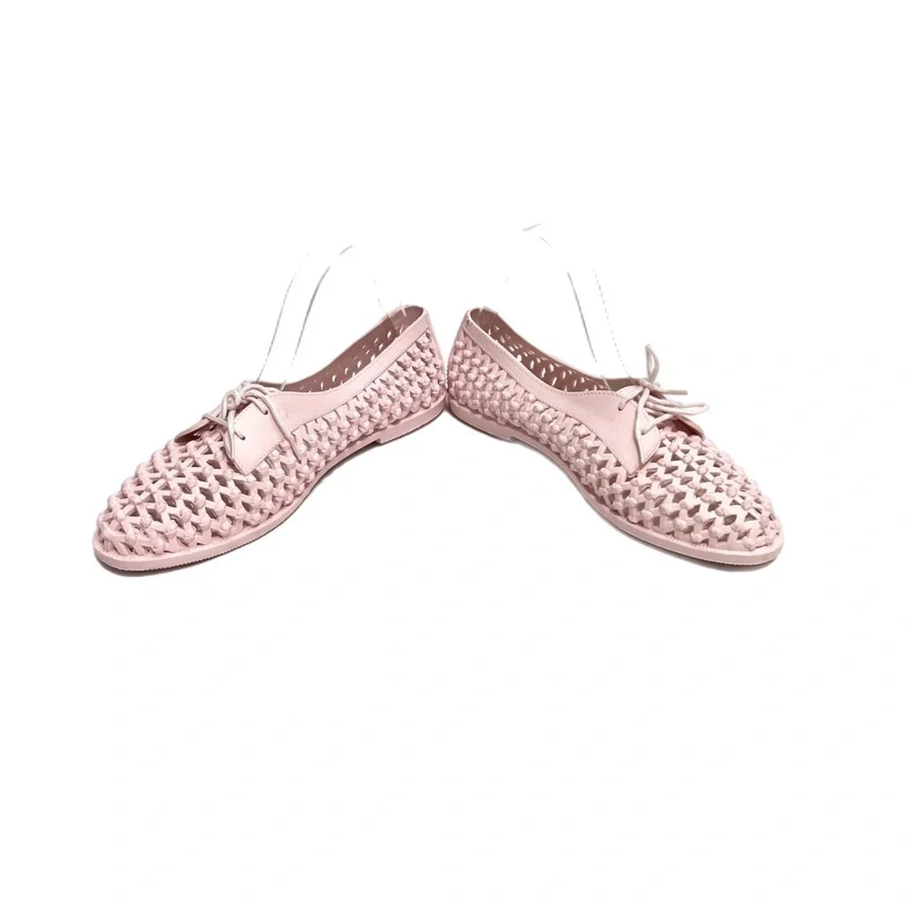 Vintage 1980s pink molded plastic lattice vented lace up deck shoes